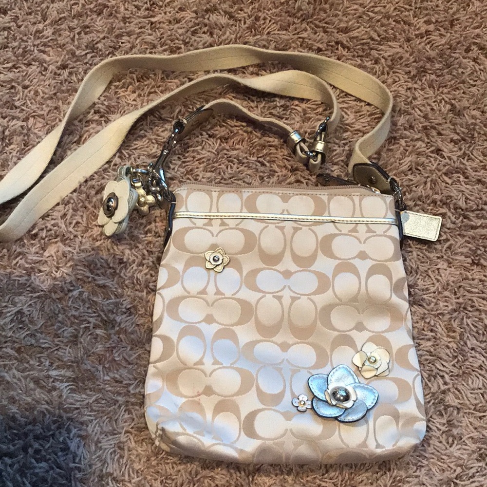 Coach crossbody, elegant pattern.